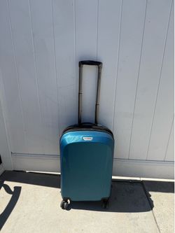 Ricardo 21” Carry-On Spinner Suitcase