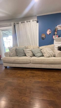 Large beige fabric sofa/couches