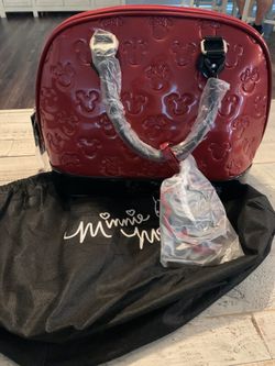 Disney’s Loungefly Minnie loves Mickey embossed bag