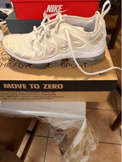 Three White Nike Shoes