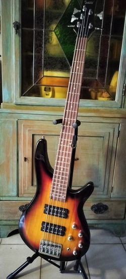 Brand new 5 string electric bass with new bag cable and shoulder strap