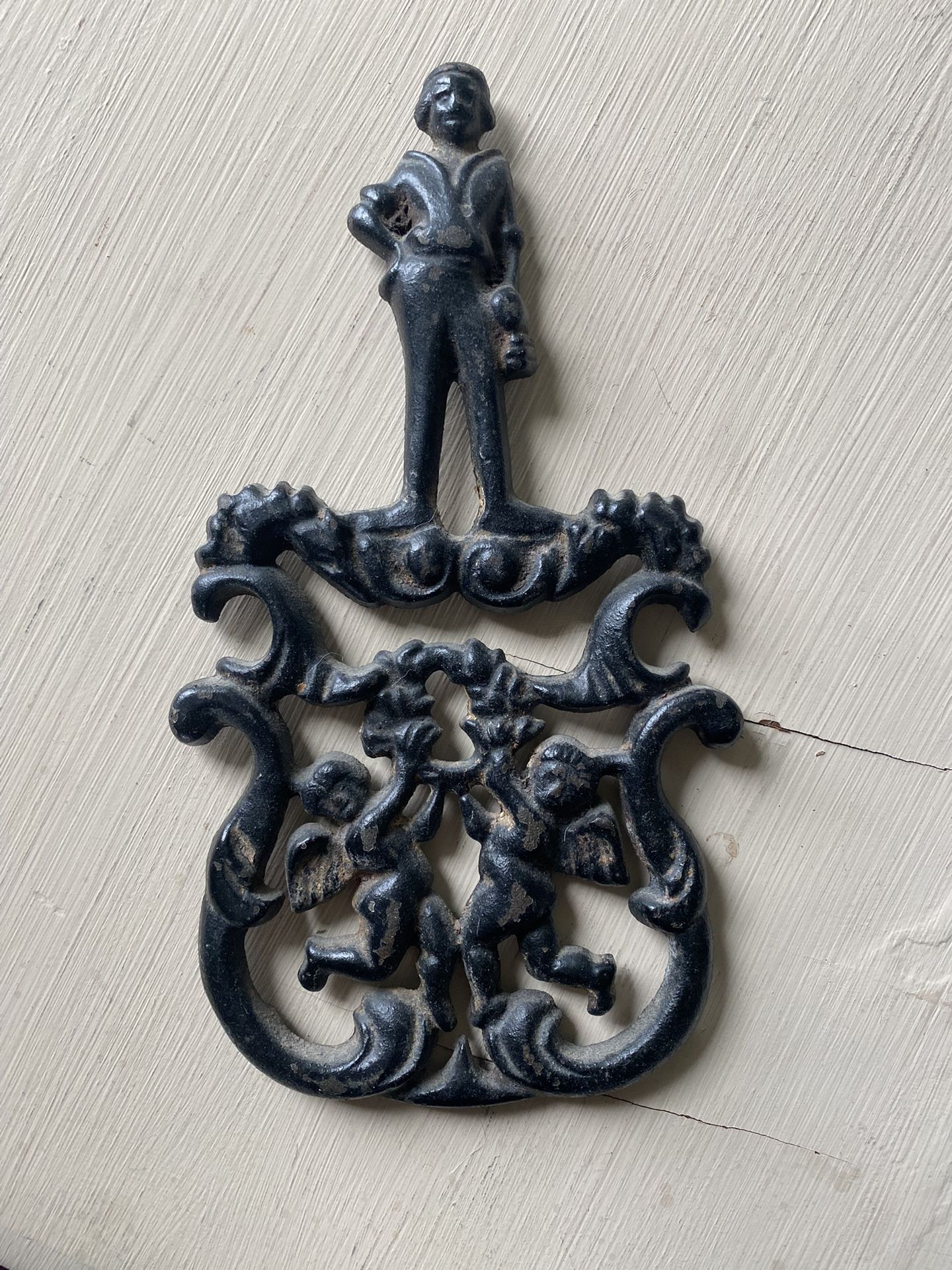 Vintage Cast Iron J.Z.H Cupid Trivet