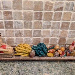 unique custom hand crafted Amazon man on canoe with goods 13 in x2"