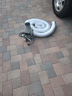 Dryer vent booster with expandable hose