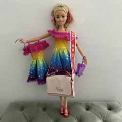 Barbie Doll - 2 feet 4 inches tall.