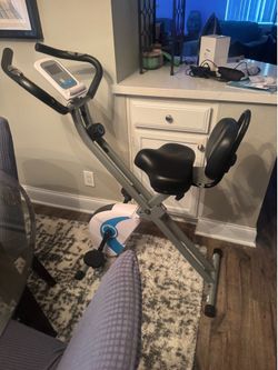 Stationary bike works great compact foldable