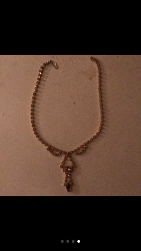 Vintage rhinestone necklace from the 1940's. Amber colored