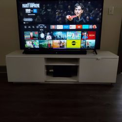 55 Inch TV and White TV Stand