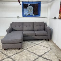Grey Sectional and Free Chair