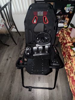 Next Level Racing Sim Cockpit with Logitech Wheel and Pedals
