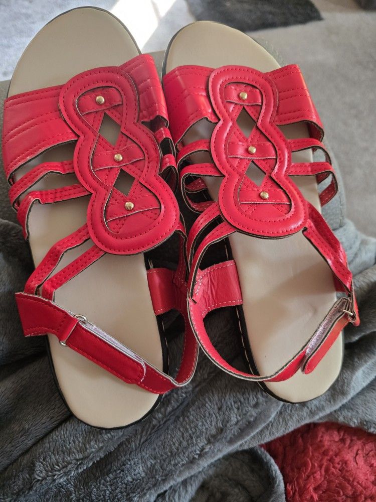 Red Sandals. Size 7 or Size 8. I'm unable to see the size. 