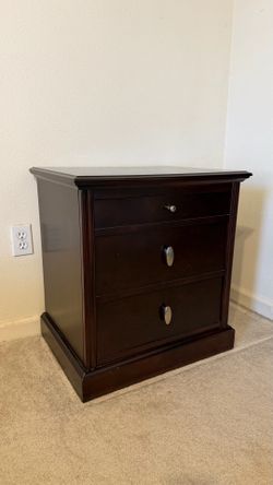 Dark wood nightstand