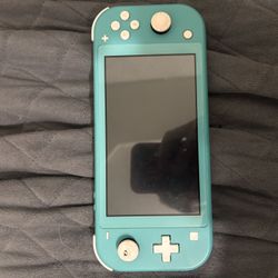 Nintendo Switch Lite + Charger