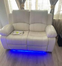 Modern loveseat with LED lights. Ask for total price.