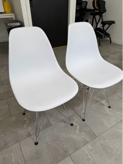 White a pair of chairs