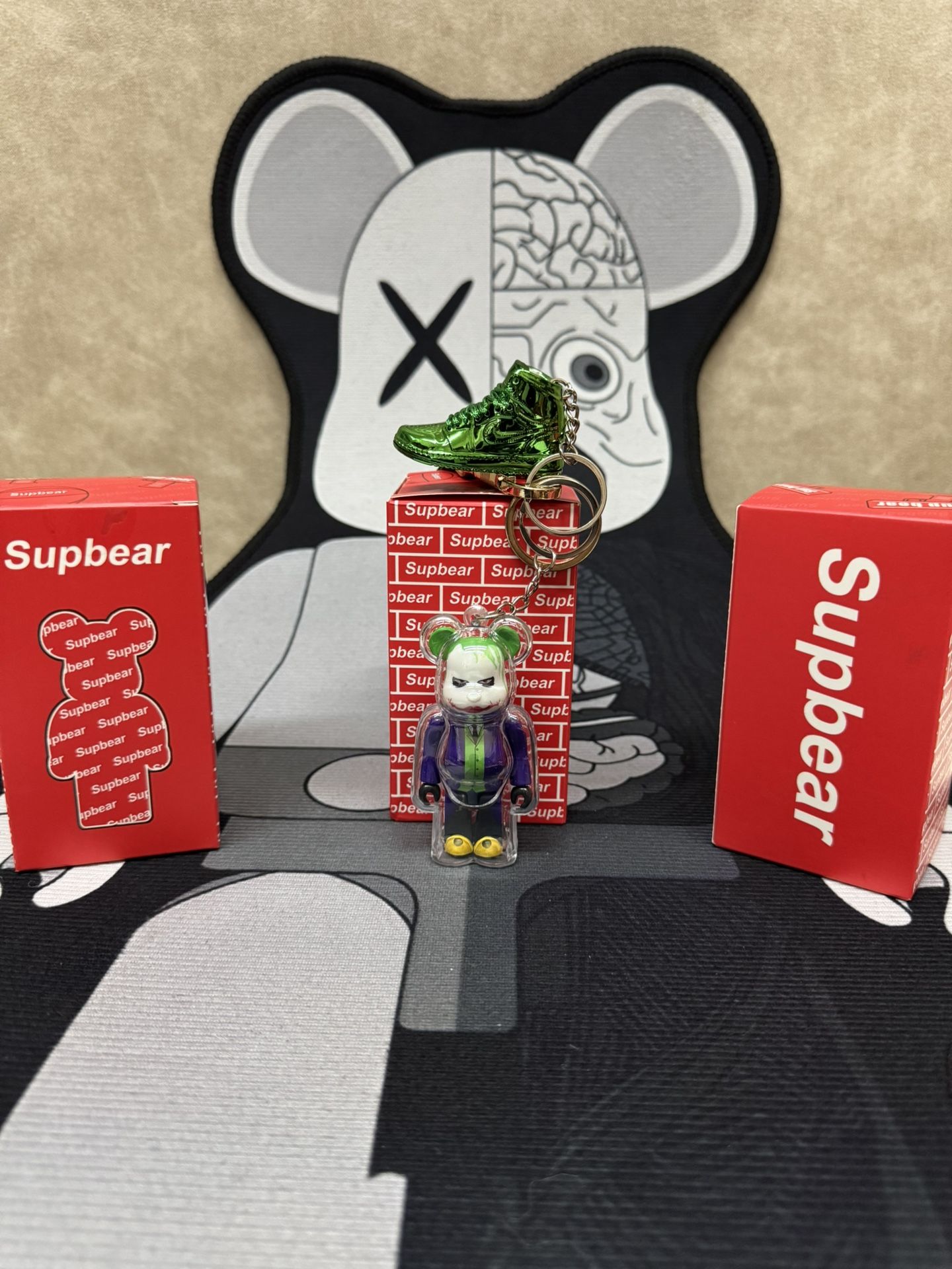 The Joker Bearbrick Keychain Set - With Shiny Green Jordan 1 OG High Sneaker Keychain & Bearbrick Print Strap – Rare Collector’s Piece