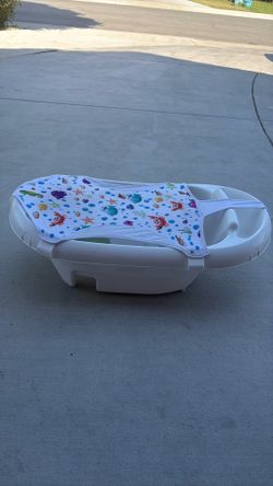 Baby bath tub with sling