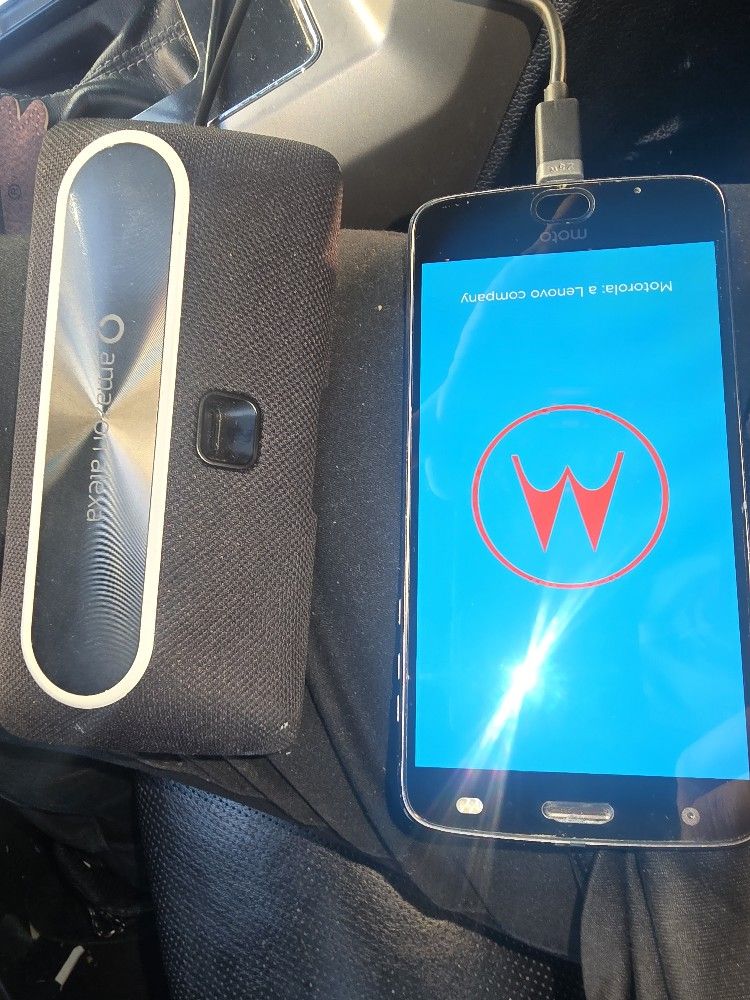 Motorola Cell & Motorola Speaker & Charger $95
