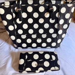 Black polka dot Guess purse .  $35