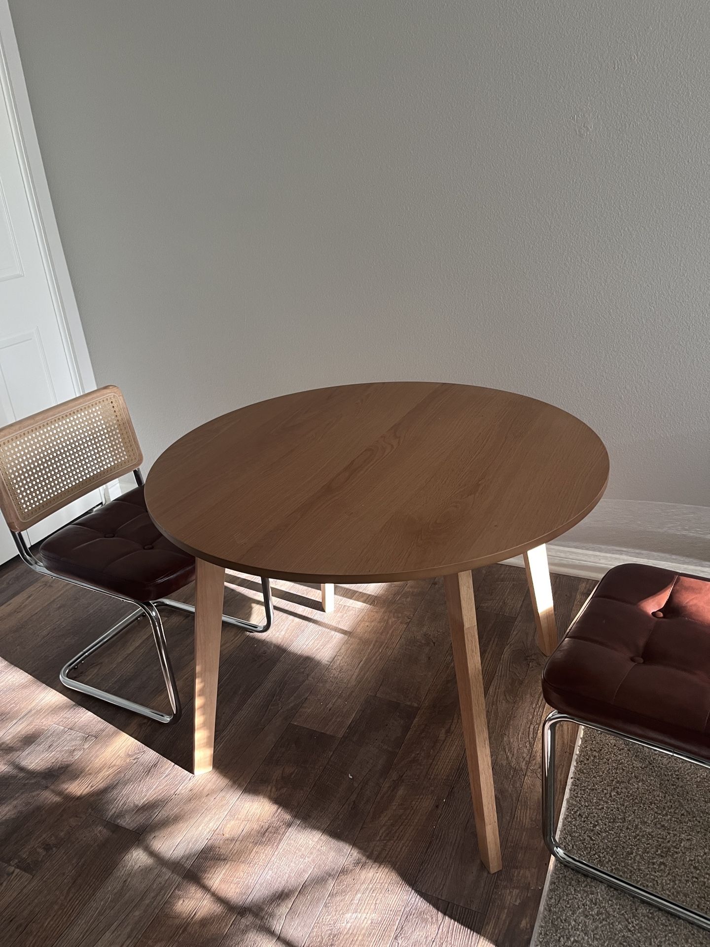 Circular dining table