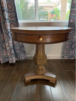 Classic round wood side table