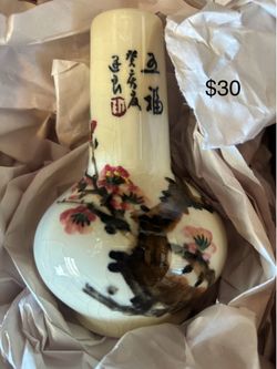 Vintage Chinese porcelain bud vase, featuring hand-painted cherry blossom designs