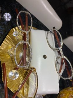 One (1) Celebrity Italian Unisex wooden frame with sparkling lab, diamond ice trim. Comes with a white protective case for secure storage. Comfortable