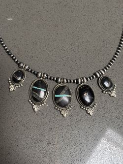 Black jack and silver necklace