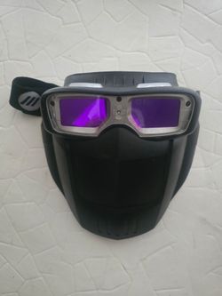 "Slightly Used" Miller Weld-Mask auto-darkening welding goggle and face shield setup. It is specifically engineered by Miller Electric as a low-profil