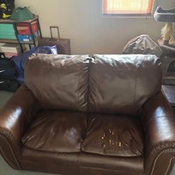 Free brown leather loveseat 