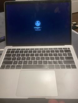 Two MacBook and iPhone 12 Pro Max