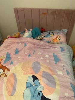 Full size pink headboard and bed frame