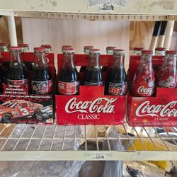 Coca-Cola collector bottles with 6 pack careers 