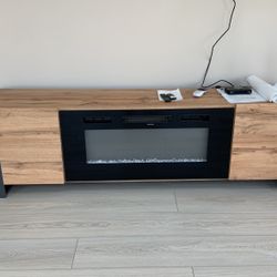 Entertainment Unit With Colored Fireplace 