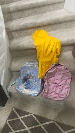 Free Girls Frozen and another Backpacks 🎒 and a rain jacket 🧥