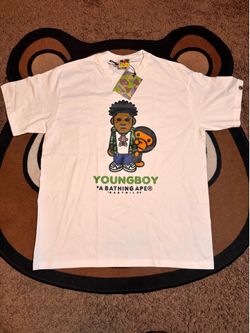 White NBA young boy X Bape white shirt size large. Brand new never worn.
