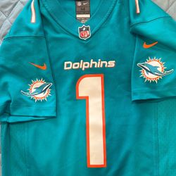 MIAMI DOLPHINS-  #1 TAGOVAILOA NFL YOUTH JERSEY. SIZE 10/12 