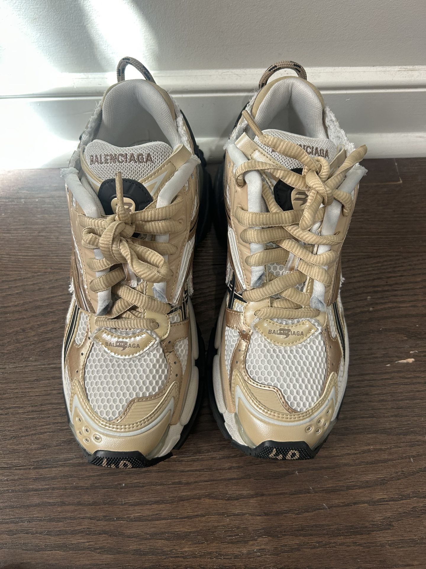 Balenciaga’s ( Uk 40 in Women)  their beige  white  and black.