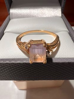 Beautiful 14kgold ring with emerald cut ametrine and brilliant cut round diamond