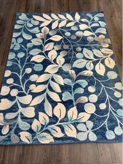 Blue Floral Area Rug with Leaf Pattern