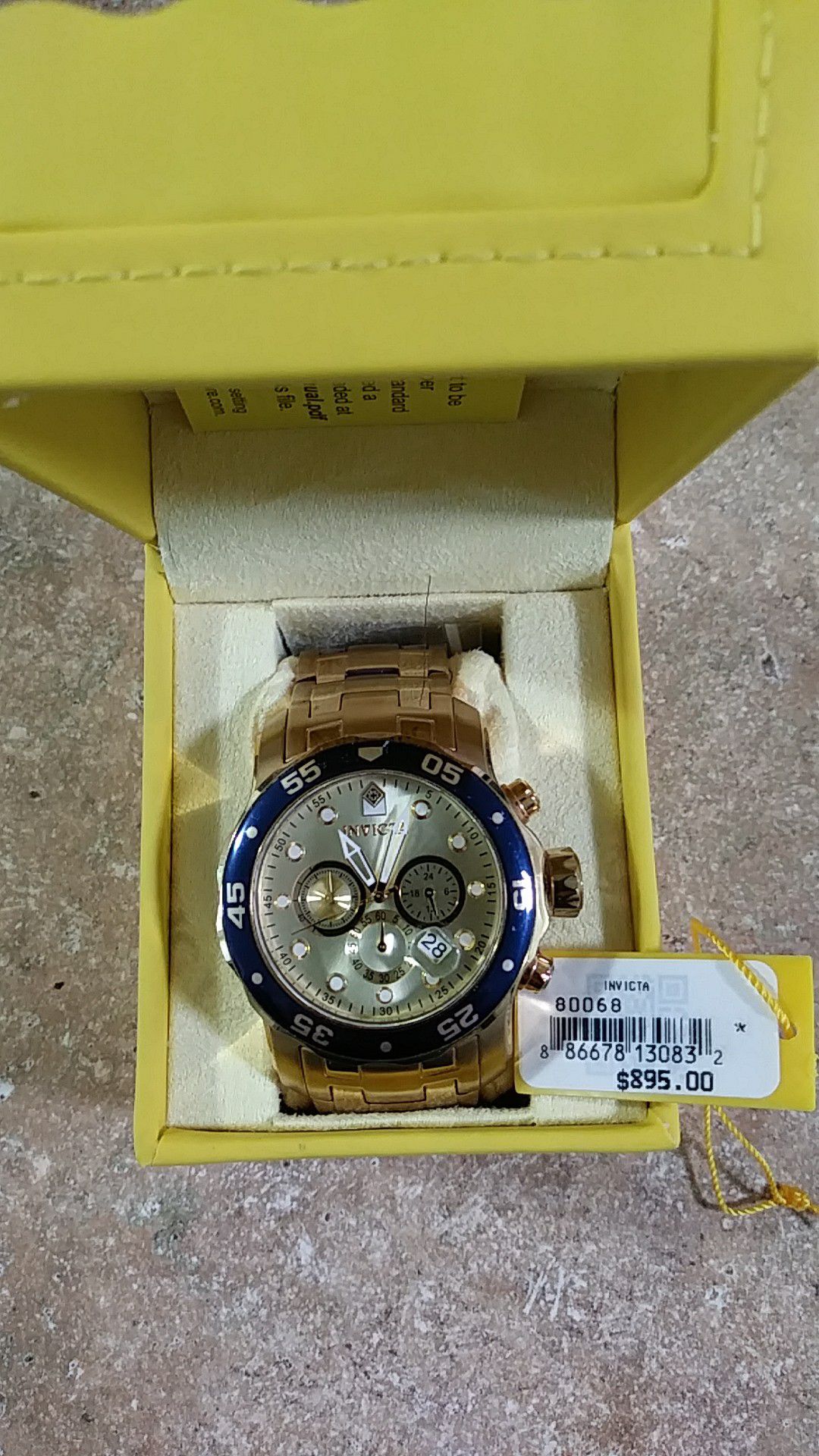 Invicta model 80068 chronograph date gold face