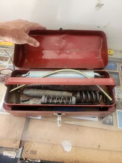 Several pieces of asst. Springs and troweling tools