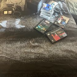 PS1 + Games + Original Game Holder