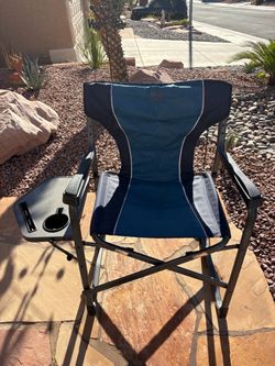THIS IS A blue and black TIMBER folding outdoor director’s chair with a built-in side table and cup holder.