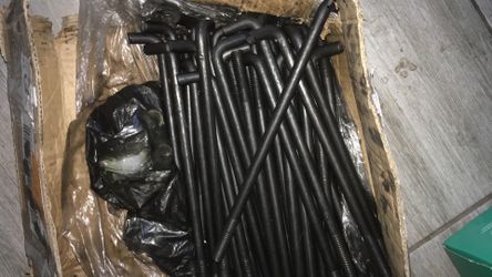 Two boxes of anchor bolts