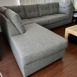 Gray Arrowmask 115” by 90” 2pc Modern Sectional Sofa with LAF Chaise by Living Spaces