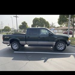 1999 F250 Super Duty and 2016 30ft wildwood RV trailer