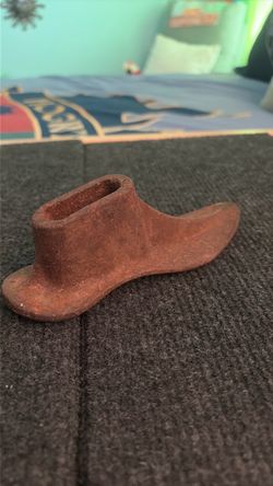 Vintage cast iron child’s shoe mold