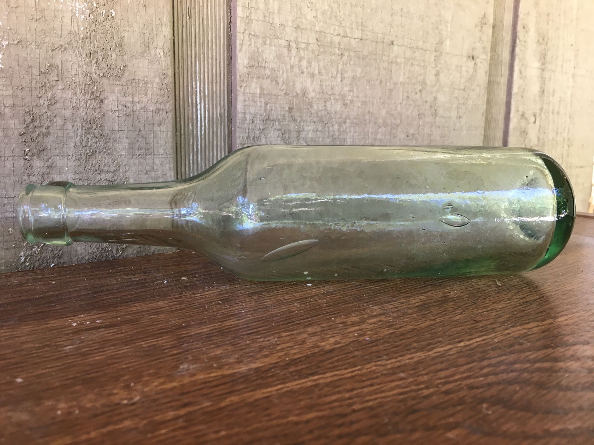 Antique round bottom soda bottle