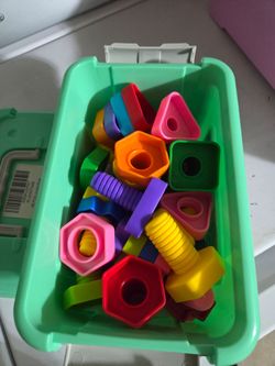 Kids play jumbo nuts